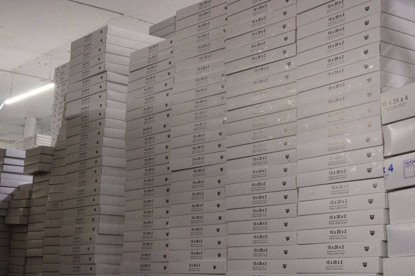 Stack of FilterHome HVAC & Furnace Air Filters on Long Island